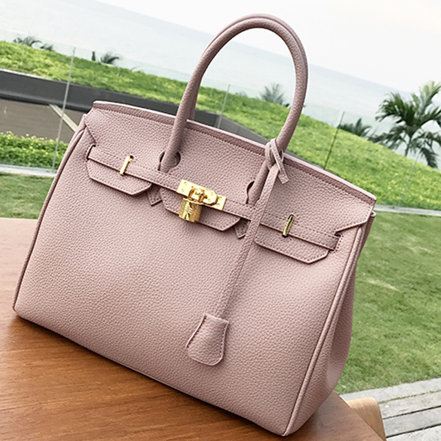 羊洋家原创手提大包