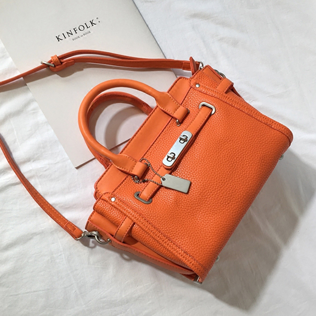 欧美旋锁翅膀包