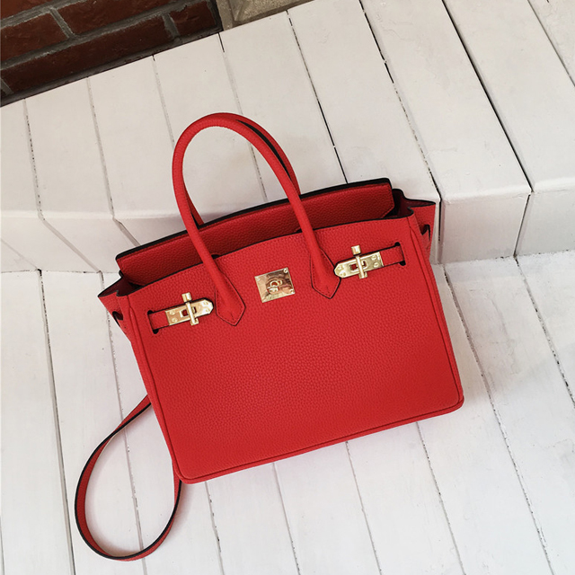 手提荔枝纹铂金包