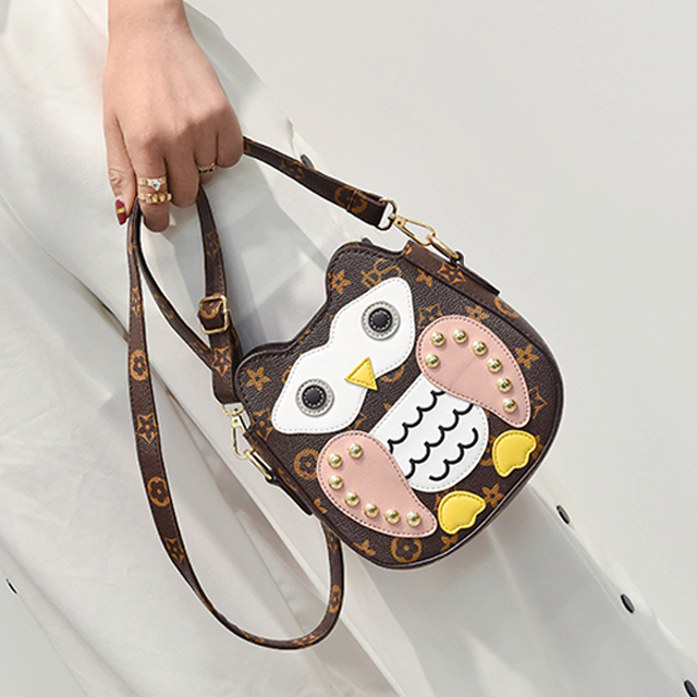 时尚铆钉印花单肩包