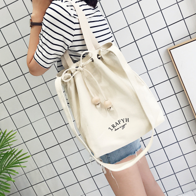日韩手工木珠抽绳帆布包