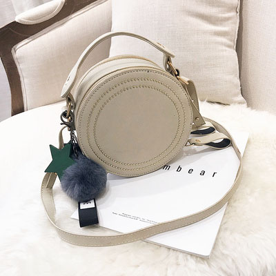 韩版百搭毛球斜挎包