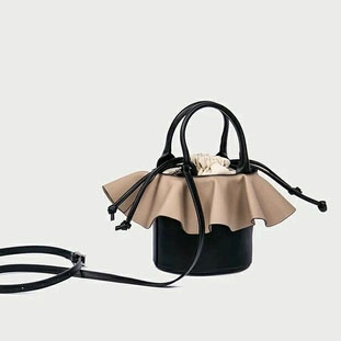 抽绳撞色单肩水桶包